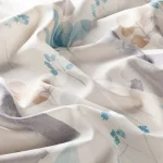 Draperii model floral alb albastru maro din poliester si in printat Botanica Gardisette latime material 140 cm