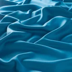 Draperii model uni albastru din poliester Dimout FR Gardisette latime material 150 cm