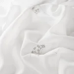 Perdele model floral alb gri din poliester brodat Floria Gardisette latime material 295 cm