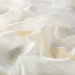 Perdele model in dungi alb galben din poliester organza Joyce Gardisette latime material 300 cm