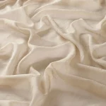 Perdele model uni crem din poliester Anna 285 Vol. 2 Gardisette latime material 285 cm