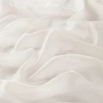 Perdele model uni crem din poliester voal Cora 300 Vol. 2 Gardisette latime material 300 cm